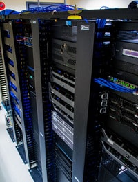 a room full of servers side by side