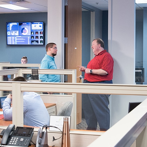 staff working in an office collaborating